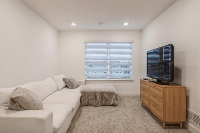 19236 Grass Lake Trl, Rogers, MN 55374 - living room featuring light colored carpet, baseboards, and recessed lighting