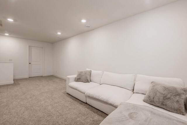 19236 Grass Lake Trl, Rogers, MN 55374 - carpeted living room with recessed lighting and baseboards