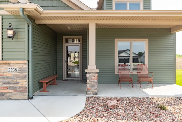 2238 Marvs Ln NE, Stewartville, MN 55976 - view of exterior entry featuring covered porch