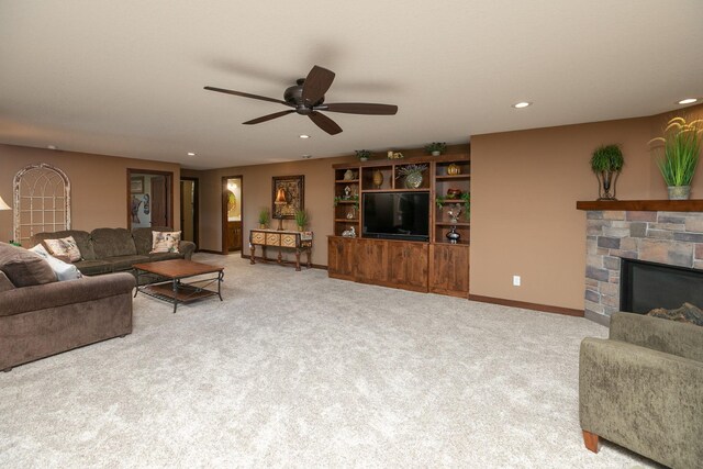 2238 Marvs Ln NE, Stewartville, MN 55976 - living room with a ceiling fan, carpet, a fireplace, recessed lighting, and baseboards