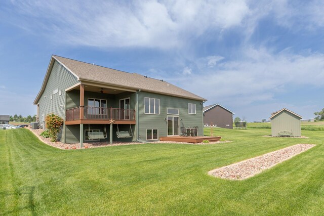 2238 Marvs Ln NE, Stewartville, MN 55976 - back of property featuring a yard, a deck, and ceiling fan