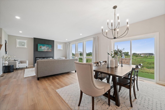 4980 Kyla Way SE, Prior Lake, MN 55372 - dining space with a chandelier, light wood-style floors, healthy amount of natural light, and recessed lighting