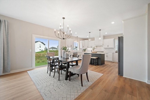 4980 Kyla Way SE, Prior Lake, MN 55372 - dining space with a chandelier, light wood finished floors, and recessed lighting