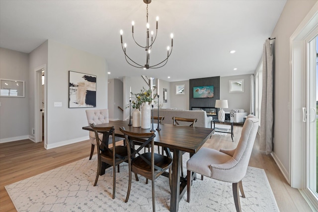 4980 Kyla Way SE, Prior Lake, MN 55372 - dining room with light wood-type flooring, a chandelier, and recessed lighting