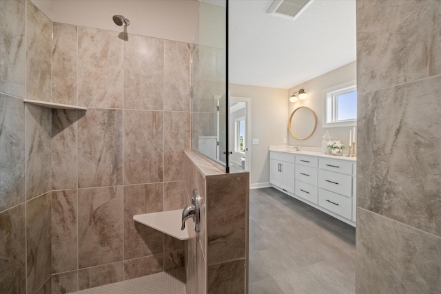 4980 Kyla Way SE, Prior Lake, MN 55372 - bathroom with walk in shower, vanity, and tile patterned floors