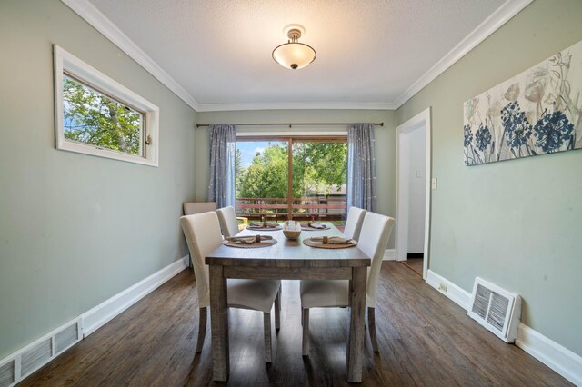 5232 Tioga St, Duluth, MN 55804 - dining area with ornamental molding, wood finished floors, and baseboards