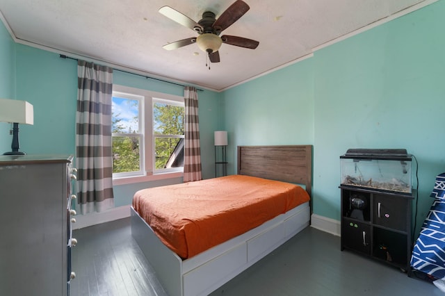 5232 Tioga St, Duluth, MN 55804 - bedroom with wood finished floors, baseboards, ceiling fan, and ornamental molding