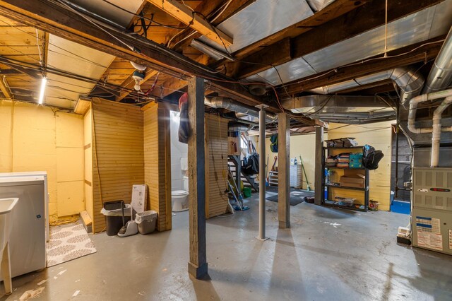 5232 Tioga St, Duluth, MN 55804 - unfinished below grade area with heating unit