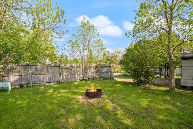 5232 Tioga St, Duluth, MN 55804 - view of yard featuring an outdoor fire pit