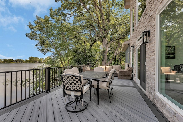565 Brooks Lake Rd NW, Cokato, MN 55321 - deck with a water view and outdoor dining area