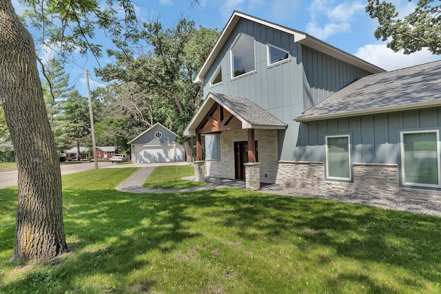 565 Brooks Lake Rd NW, Cokato, MN 55321 - view of front of property with a garage, board and batten siding, roof with shingles, and a front yard