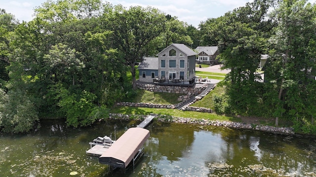 565 Brooks Lake Rd NW, Cokato, MN 55321 - dock area with stairs, a yard, and a deck with water view