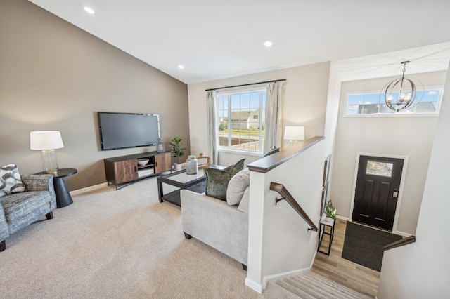 129 Terning Way, Howard Lake, MN 55349 - carpeted living room featuring plenty of natural light, a chandelier, baseboards, recessed lighting, and vaulted ceiling