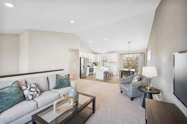 129 Terning Way, Howard Lake, MN 55349 - living room with lofted ceiling, light carpet, and recessed lighting