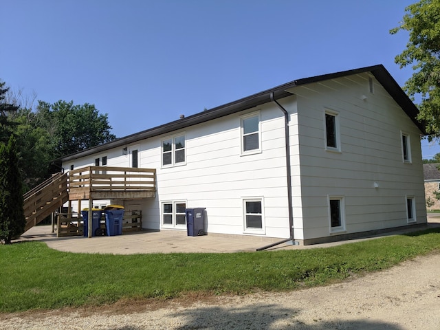 1101 Spring Creek Rd, Northfield, MN 55057 - rear view of property with a patio area, a wooden deck, and stairway