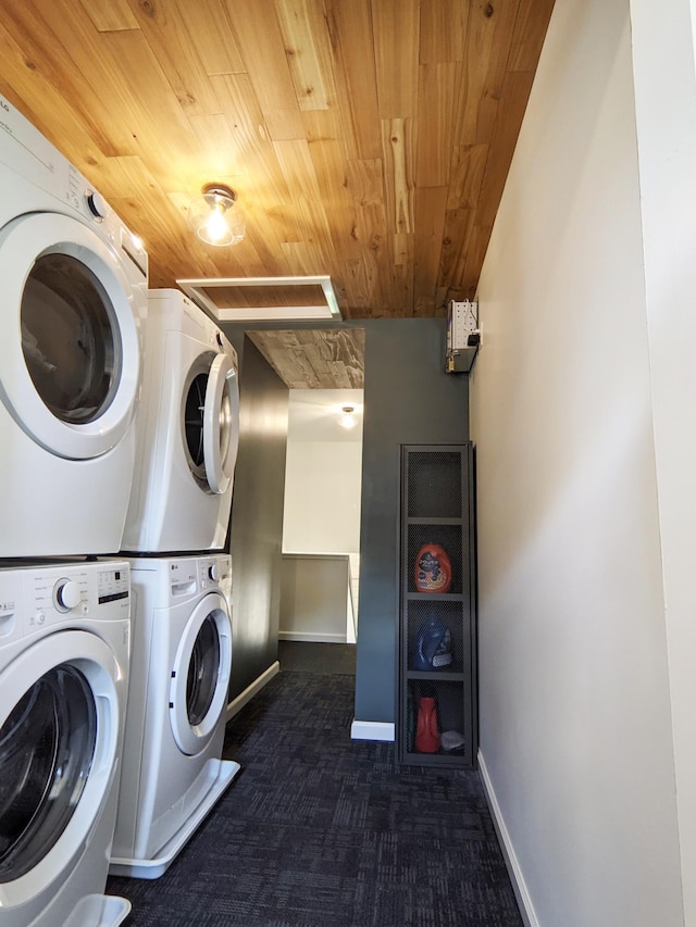 1101 Spring Creek Rd, Northfield, MN 55057 - laundry area with wood ceiling, stacked washer / dryer, dark colored carpet, and baseboards