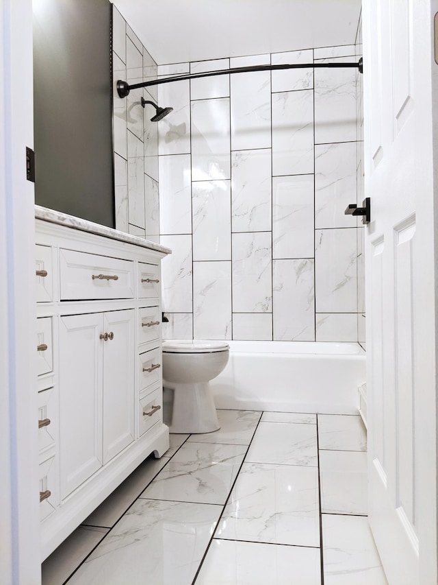 1101 Spring Creek Rd, Northfield, MN 55057 - full bathroom featuring marble look tile flooring, toilet, vanity, and bathing tub / shower combination