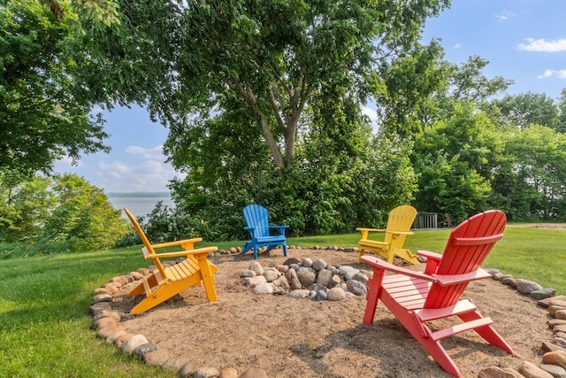 13771 Schuelke Beach Rd NW, Leaf Valley Twp, MN 56354 - view of playground featuring an outdoor fire pit, a yard, and a water view
