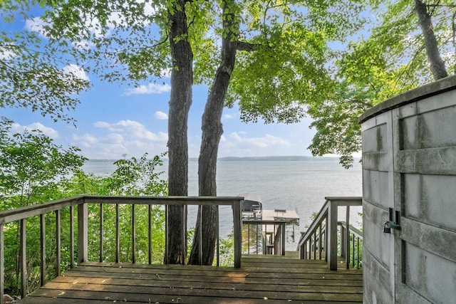13771 Schuelke Beach Rd NW, Leaf Valley Twp, MN 56354 - wooden deck with a water view