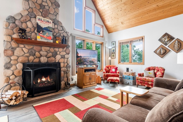 13771 Schuelke Beach Rd NW, Leaf Valley Twp, MN 56354 - living area with wood finished floors, a fireplace, high vaulted ceiling, and wooden ceiling