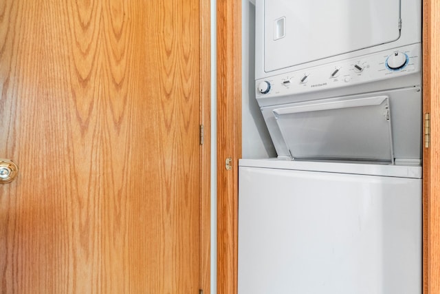 13771 Schuelke Beach Rd NW, Leaf Valley Twp, MN 56354 - laundry area with stacked washing machine and dryer