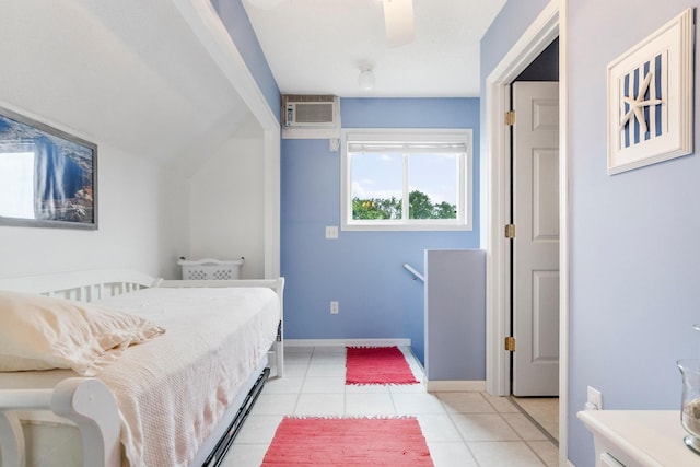 13771 Schuelke Beach Rd NW, Leaf Valley Twp, MN 56354 - bedroom with a wall mounted air conditioner, light tile patterned flooring, and baseboards
