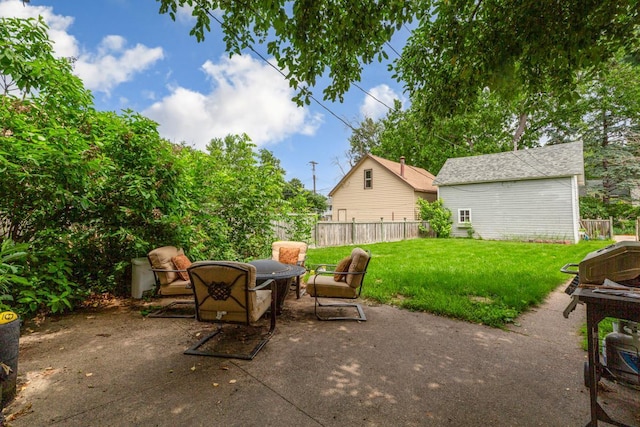 407 4th Ave SW, Faribault, MN 55021 - view of patio featuring a fire pit