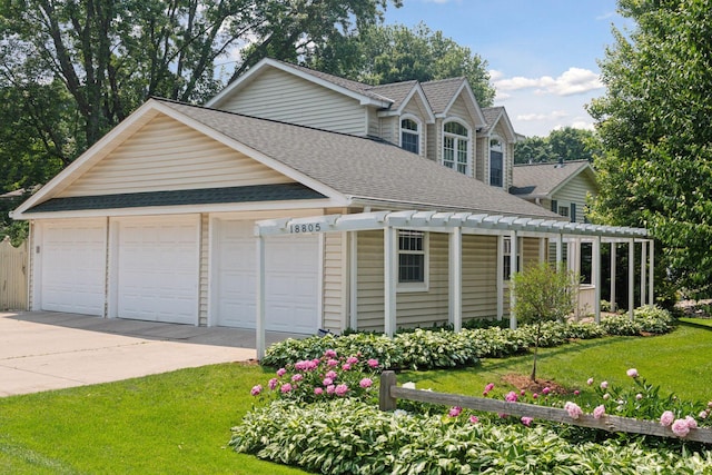 18805 Azure Rd, Deephaven, MN 55391 - view of front of home with a shingled roof, a detached garage, a front yard, and a pergola