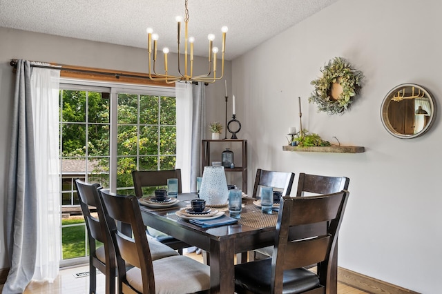 18125 Fillmore St NE, East Bethel, MN 55011 - dining space featuring a chandelier and a textured ceiling