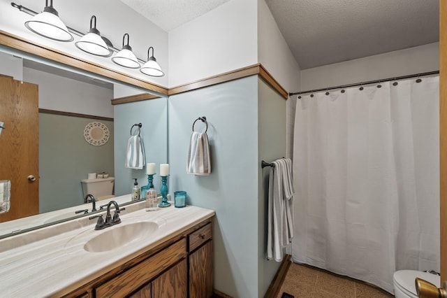 18125 Fillmore St NE, East Bethel, MN 55011 - full bath featuring vanity, curtained shower, and a textured ceiling