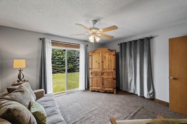 18125 Fillmore St NE, East Bethel, MN 55011 - carpeted living area featuring a ceiling fan and a textured ceiling