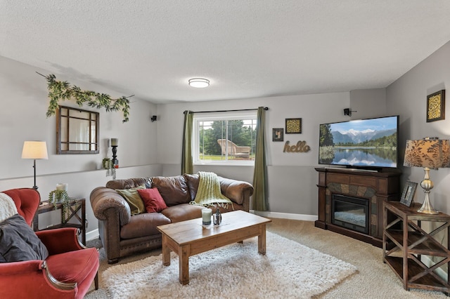 18125 Fillmore St NE, East Bethel, MN 55011 - carpeted living room featuring a textured ceiling and a glass covered fireplace