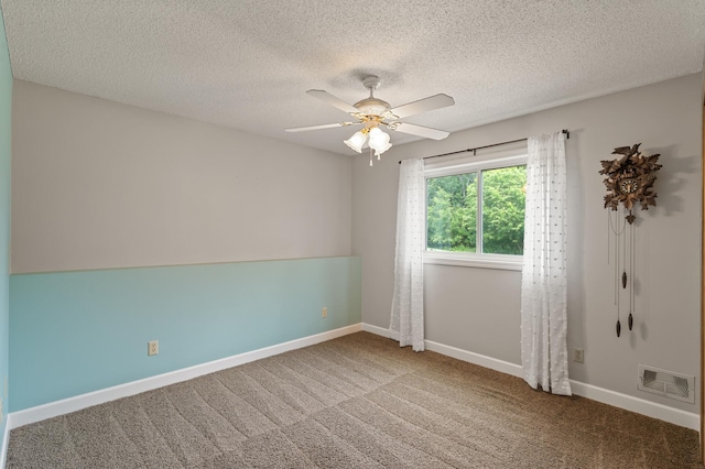 18125 Fillmore St NE, East Bethel, MN 55011 - spare room with carpet, a ceiling fan, and a textured ceiling
