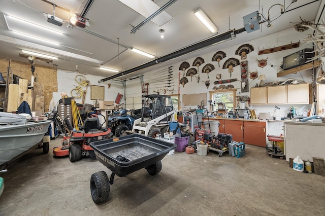 18125 Fillmore St NE, East Bethel, MN 55011 - garage featuring a workshop area