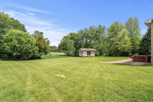 18125 Fillmore St NE, East Bethel, MN 55011 - view of grassy yard featuring a hot tub