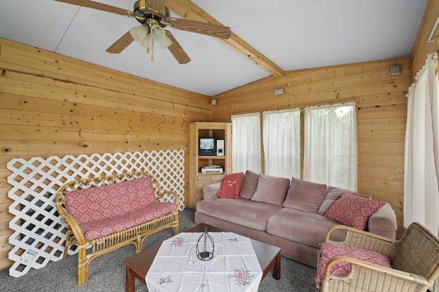 18125 Fillmore St NE, East Bethel, MN 55011 - living room featuring wooden walls, a ceiling fan, and carpet flooring