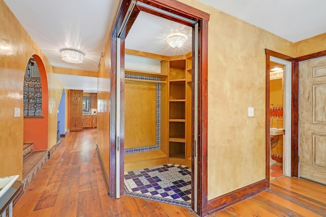 1919 Timberline Spur, Minnetonka, MN 55305 - hall with wood-type flooring and arched walkways