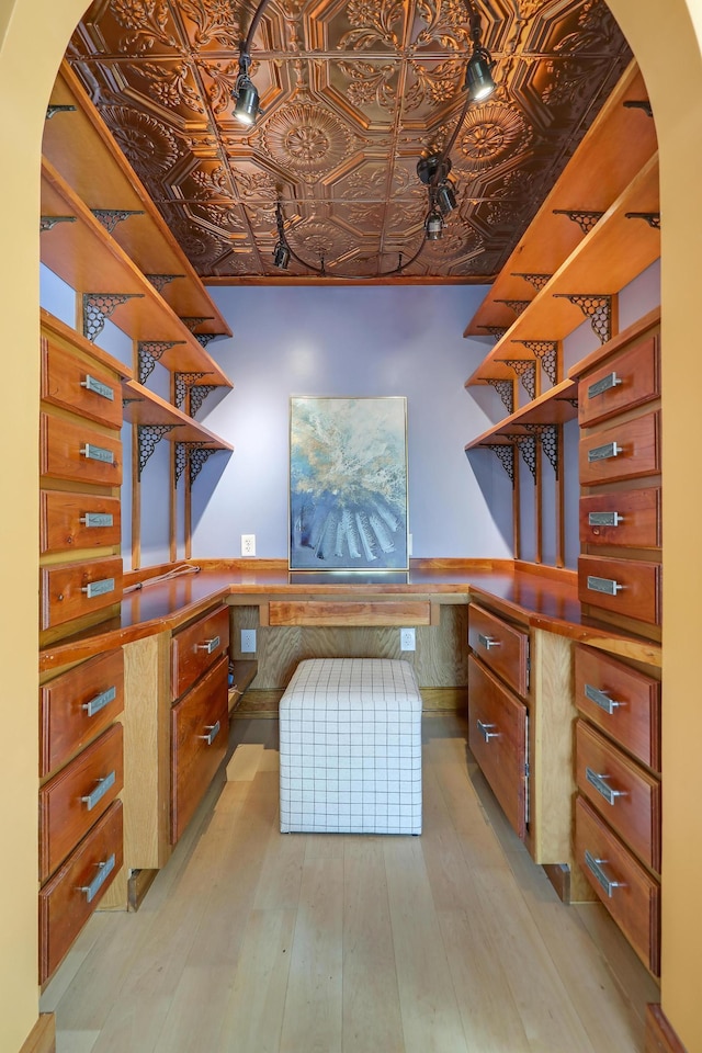 1919 Timberline Spur, Minnetonka, MN 55305 - office with arched walkways, built in study area, light wood-type flooring, and an ornate ceiling