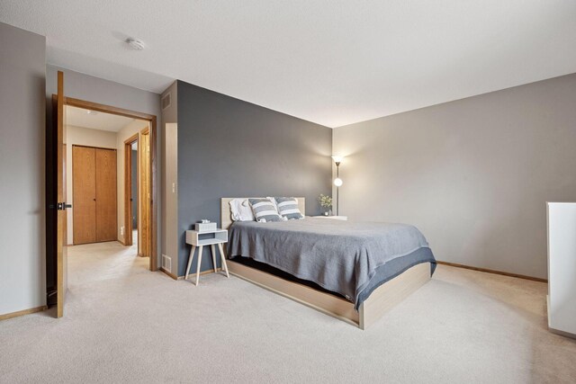 2436 Mendelssohn Ln N, Golden Valley, MN 55427 - bedroom with light colored carpet and baseboards