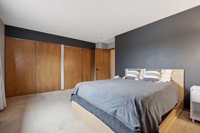 2436 Mendelssohn Ln N, Golden Valley, MN 55427 - bedroom featuring light colored carpet and multiple closets