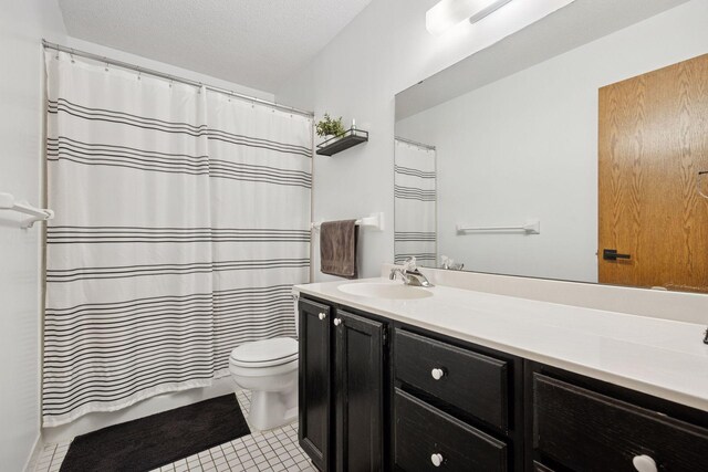 2436 Mendelssohn Ln N, Golden Valley, MN 55427 - bathroom with vanity, tile patterned flooring, toilet, and curtained shower