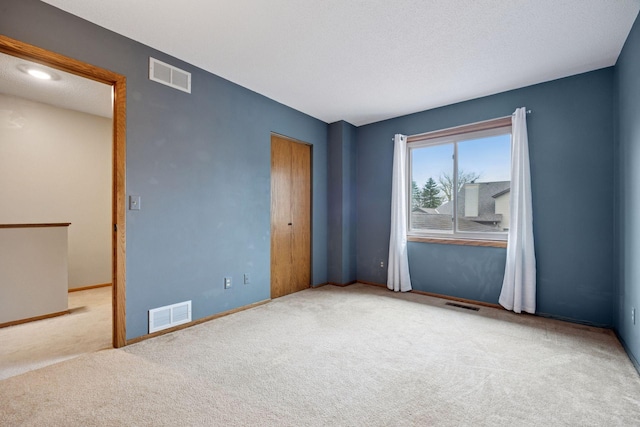2436 Mendelssohn Ln N, Golden Valley, MN 55427 - empty room featuring carpet floors and baseboards