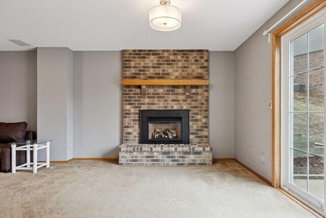 2436 Mendelssohn Ln N, Golden Valley, MN 55427 - unfurnished living room featuring carpet floors, a brick fireplace, baseboards, and a textured ceiling