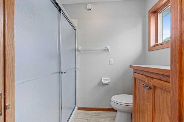 3868 Green Heights Trl SW, Prior Lake, MN 55372 - full bath with a shower stall, wood finished floors, and vanity