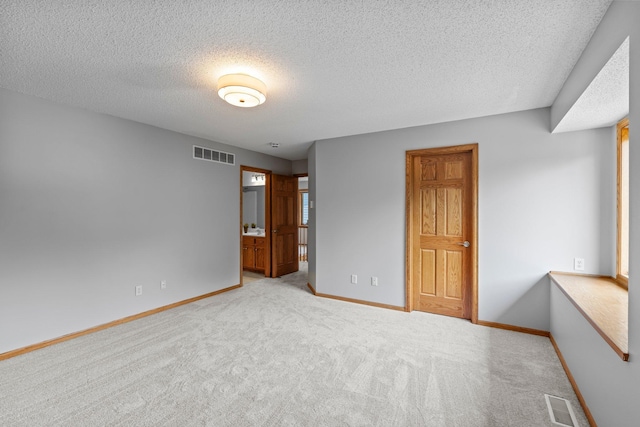 3868 Green Heights Trl SW, Prior Lake, MN 55372 - unfurnished bedroom featuring carpet flooring and a textured ceiling
