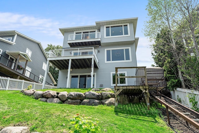3868 Green Heights Trl SW, Prior Lake, MN 55372 - back of property featuring a wooden deck, a balcony, and stairs