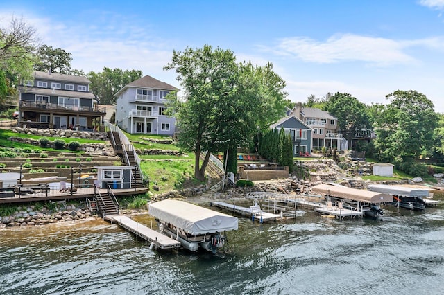 3868 Green Heights Trl SW, Prior Lake, MN 55372 - dock area featuring boat lift, a water view, and stairs