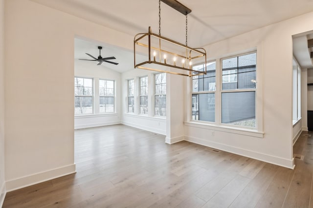 20141 63rd Ave, Corcoran, MN 55340 - unfurnished sunroom with healthy amount of natural light, a chandelier, and vaulted ceiling