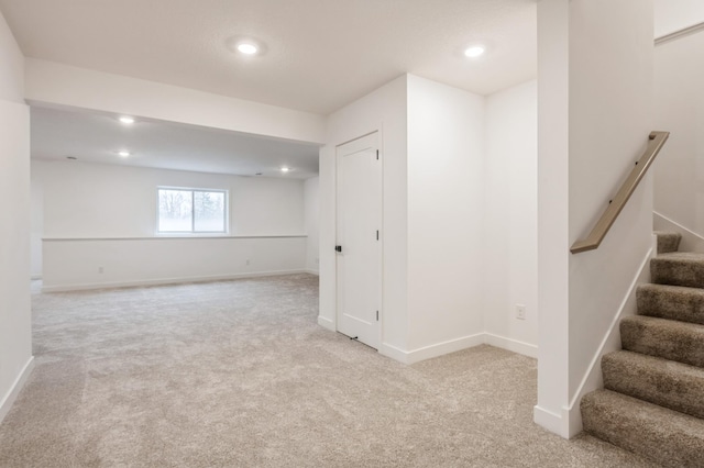 20141 63rd Ave, Corcoran, MN 55340 - basement with light colored carpet, recessed lighting, baseboards, and stairway