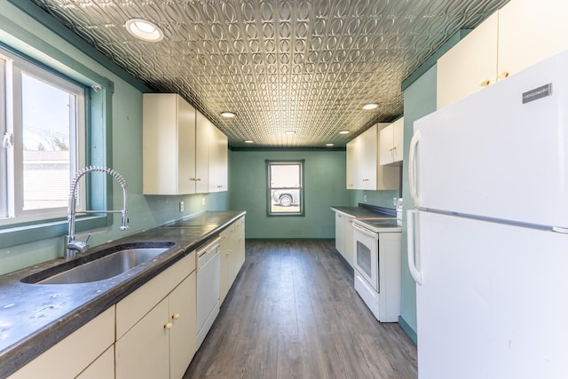 25 4th Ave, Soudan, MN 55782 - kitchen featuring white appliances, a sink, white cabinetry, an ornate ceiling, and dark wood-type flooring